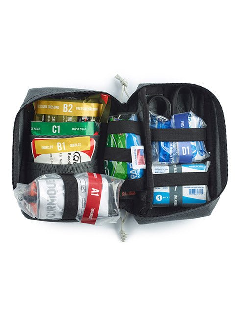 Open view of the Mobilize Rescue Systems compact kit - ZOLL Trauma Kit with contents color and number coded inside