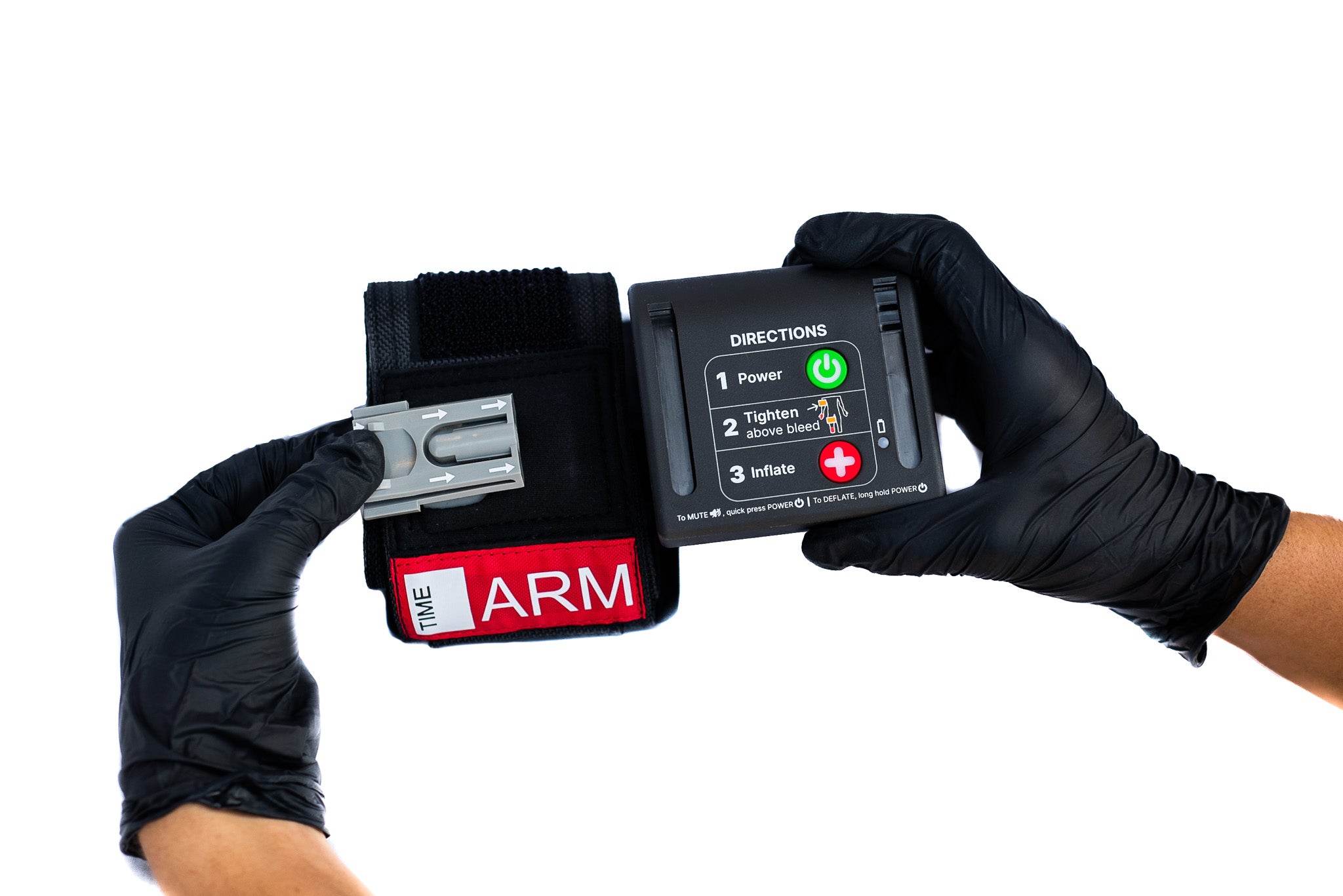 AutoTQ device labeled 'TIME ARM' held by a person wearing black gloves on a white background with removed inflator