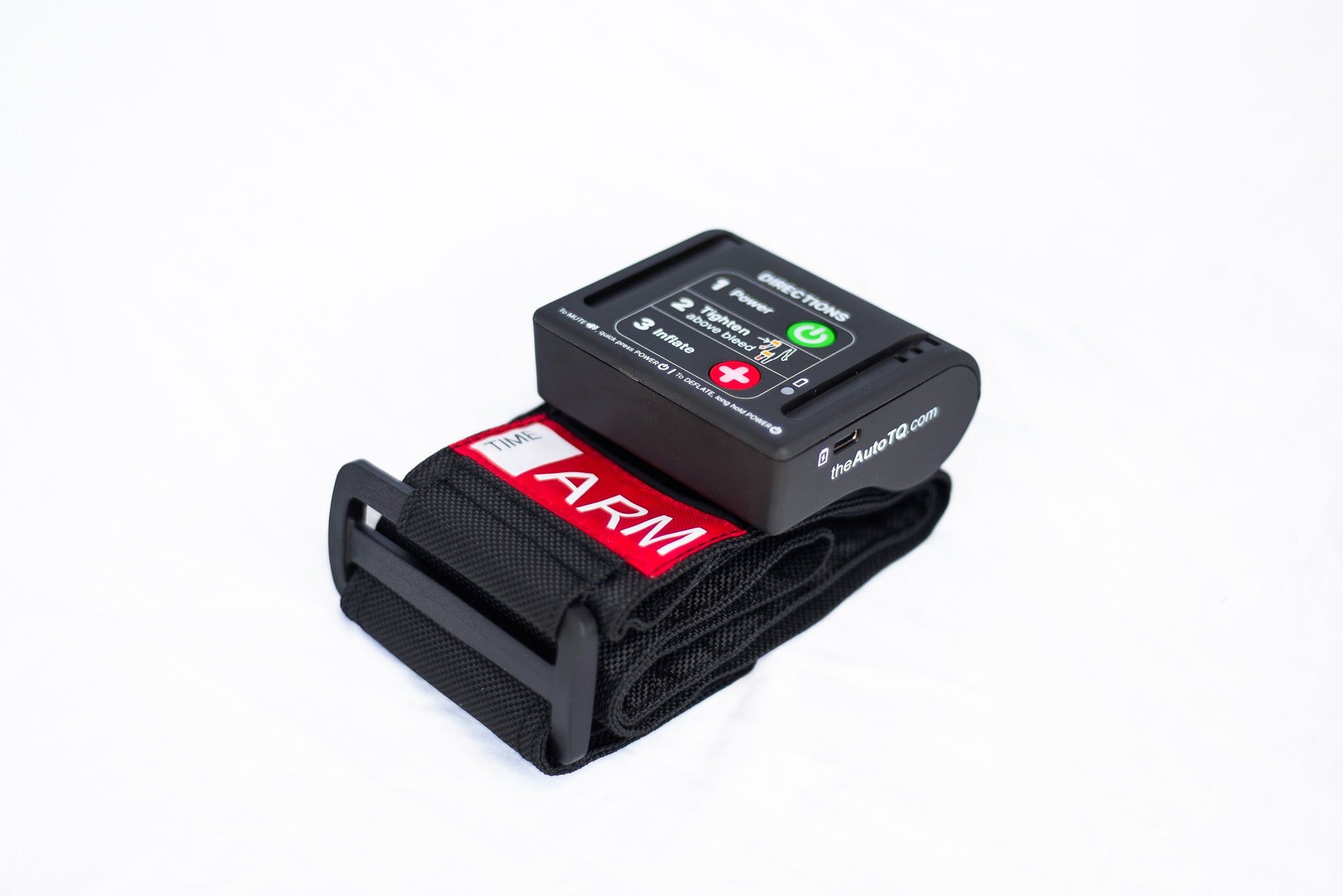 Black AutoTQ device with a red 'ARM' label on a white background